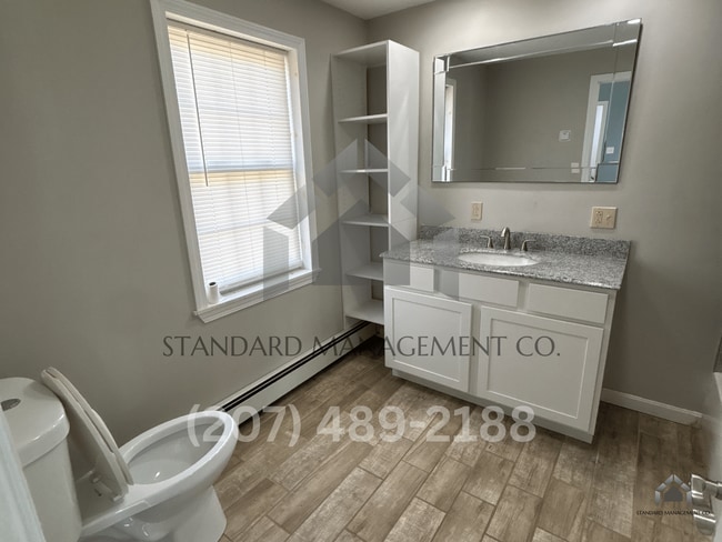 Building Photo - Spacious Updated 4BR/3BA Home | Garage, W/D, Pet-Friendly – $2,700