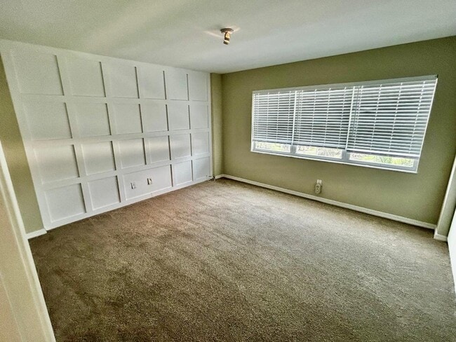 Bedroom #1: feature wall headboard - 1100 N Shore Dr NE