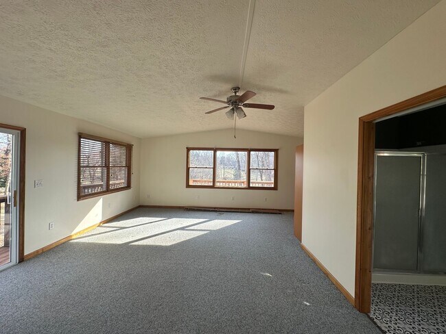 Building Photo - House in Bedford with Lot of Outdoor Space.