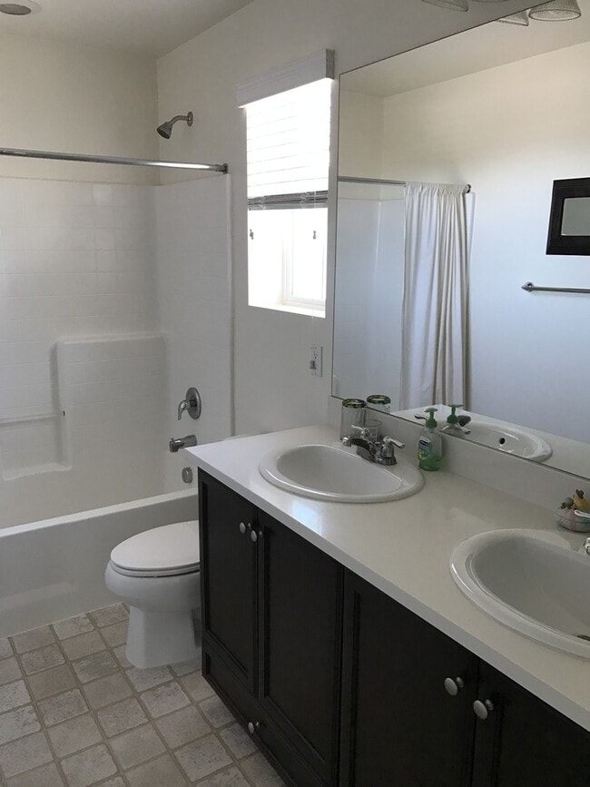 Building Photo - Private large 4 bed NextGen, with double living rooms, kitchens and laundries.