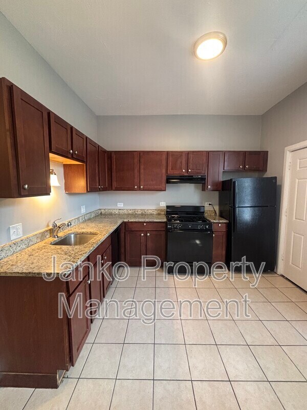 Building Photo - 6606 S Evans Ave