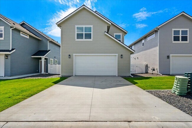 Building Photo - Brand New, Stylish 4-Bedroom Home with Vaulted Ceilings and Private Patio