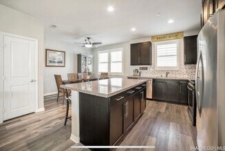 Building Photo - Available Now! Beautifully updated 3-story...