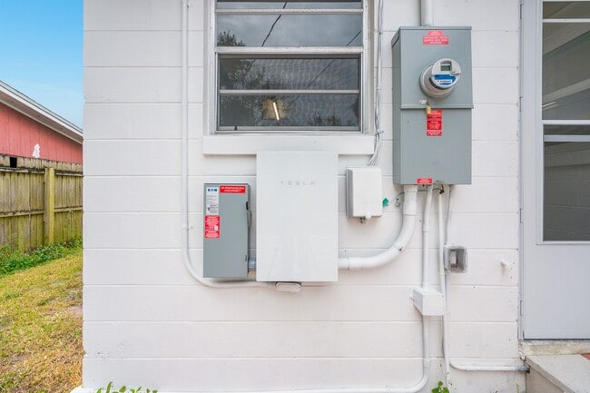 Building Photo - Say Goodbye to Electric Bills & Hurricane Outages with a Solar-Powered Home