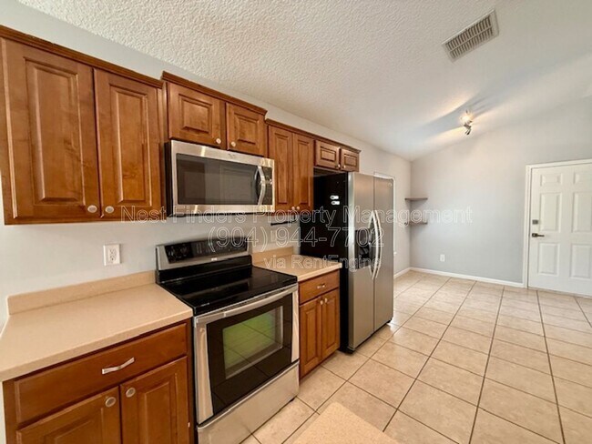 Building Photo - 4509 Deep River Way E