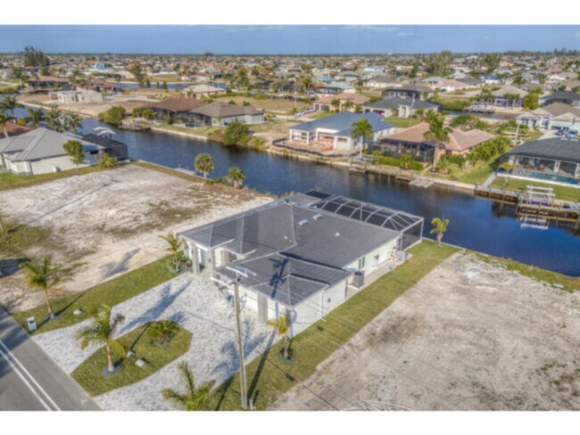 Building Photo - Available Now! Waterfront paradise.