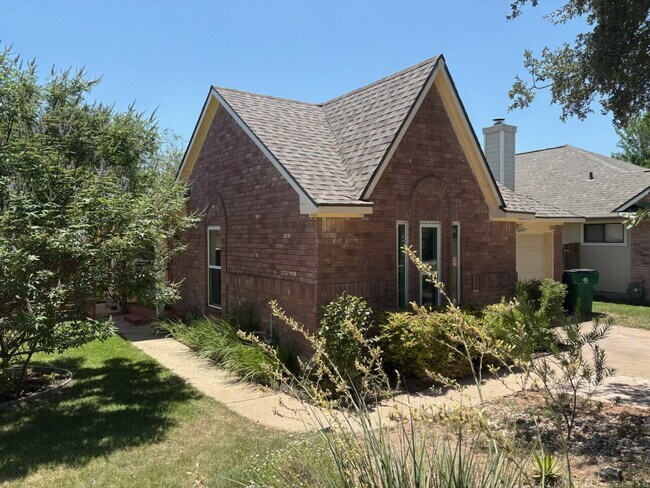 Building Photo - Updated 4-Bedroom 2 Bathroom Austin Home with Beautiful Backyard