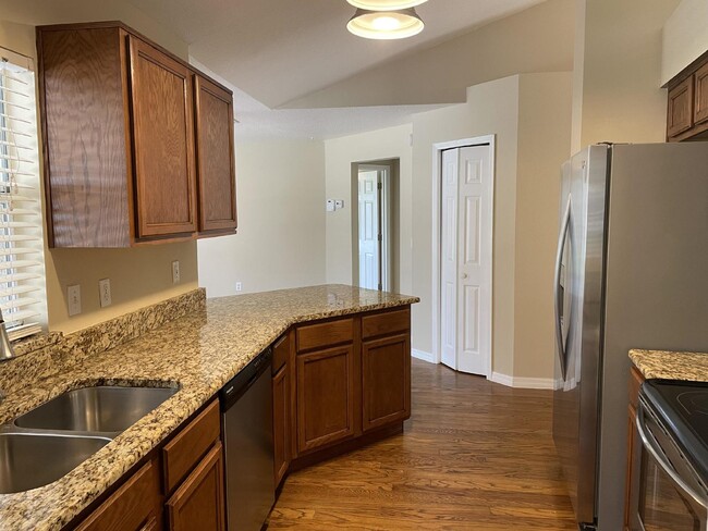 Building Photo - Beautiful 3 Bedroom 2 Bath Pool Home Lawn ...