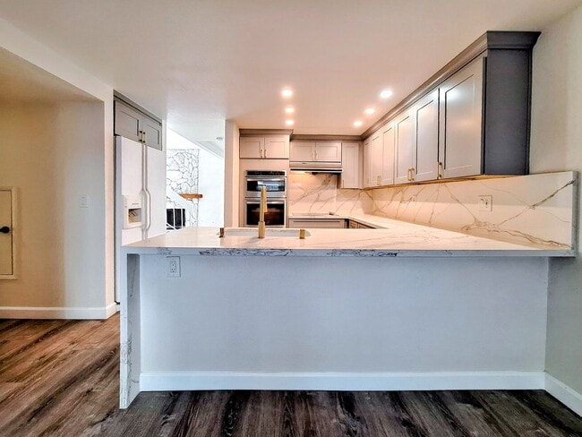 Building Photo - Spacious Two-Story 3bd Townhouse With Private Patios, Balcony, & Garage