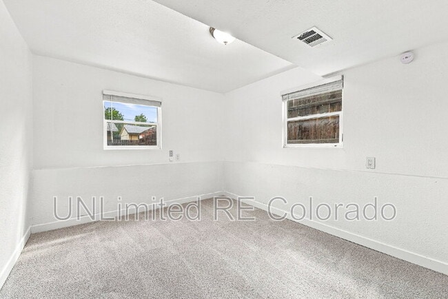 Building Photo - 3668 E 91st Ave