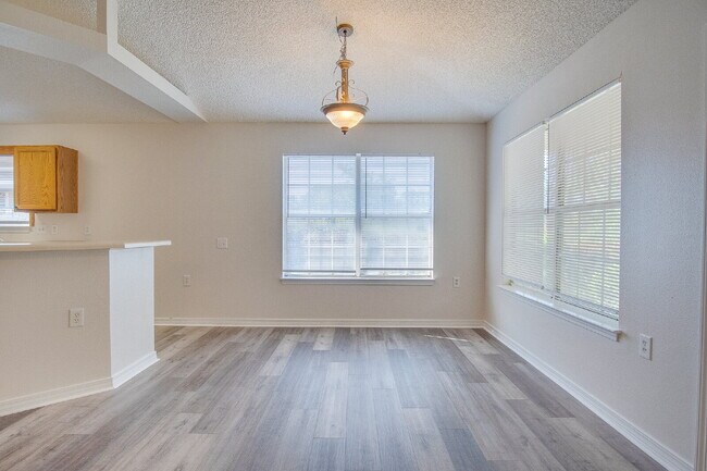 Building Photo - Lakefront Living in Gulf Breeze – Spacious...