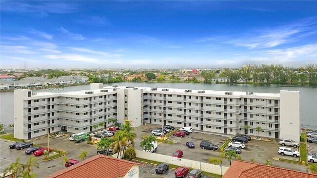 Building Photo - 9917 W Okeechobee Rd