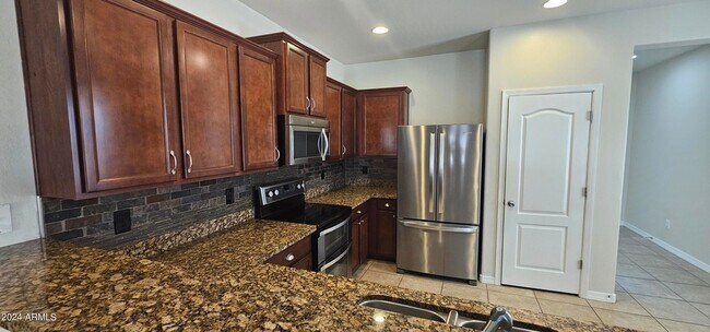 Building Photo - 10430 E Verbina Ln
