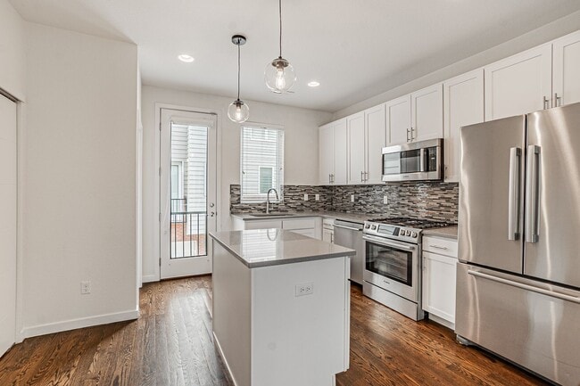 Building Photo - Modern 2BD, 3BA RiNo Townhome with Garage and Rooftop Deck