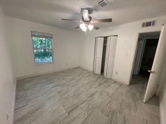 Building Photo - 6831 Tiki Ln