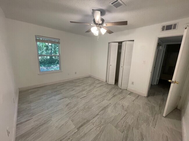 Building Photo - 6832 Tiki Ln