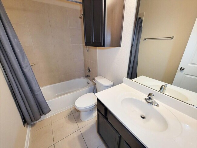 Building Photo - "Charming 3-Bed, 2-Bath Retreat in Humble, TX – Your Perfect Home Awaits on Justin Ridge Ln!"