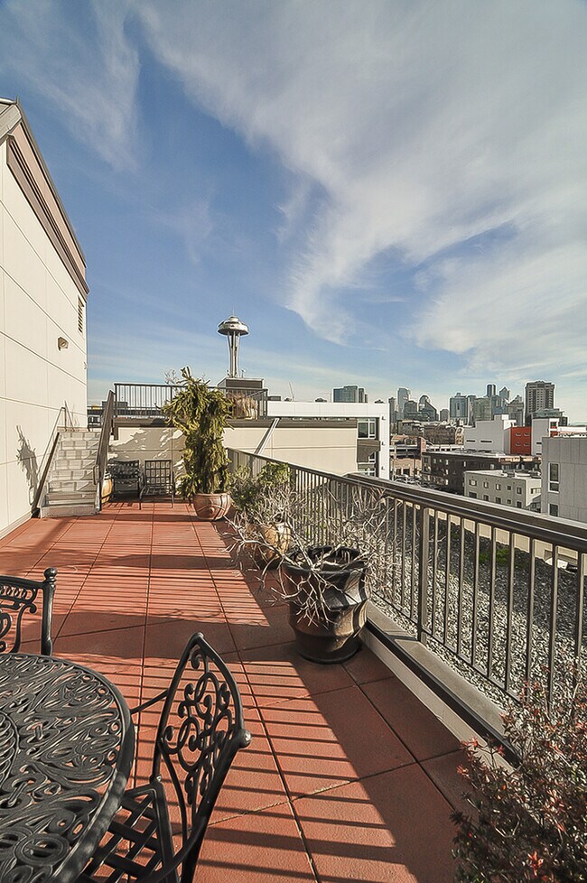 Building Photo - Top floor corner one-bedroom in the heart of it all, don't miss out, tour today!