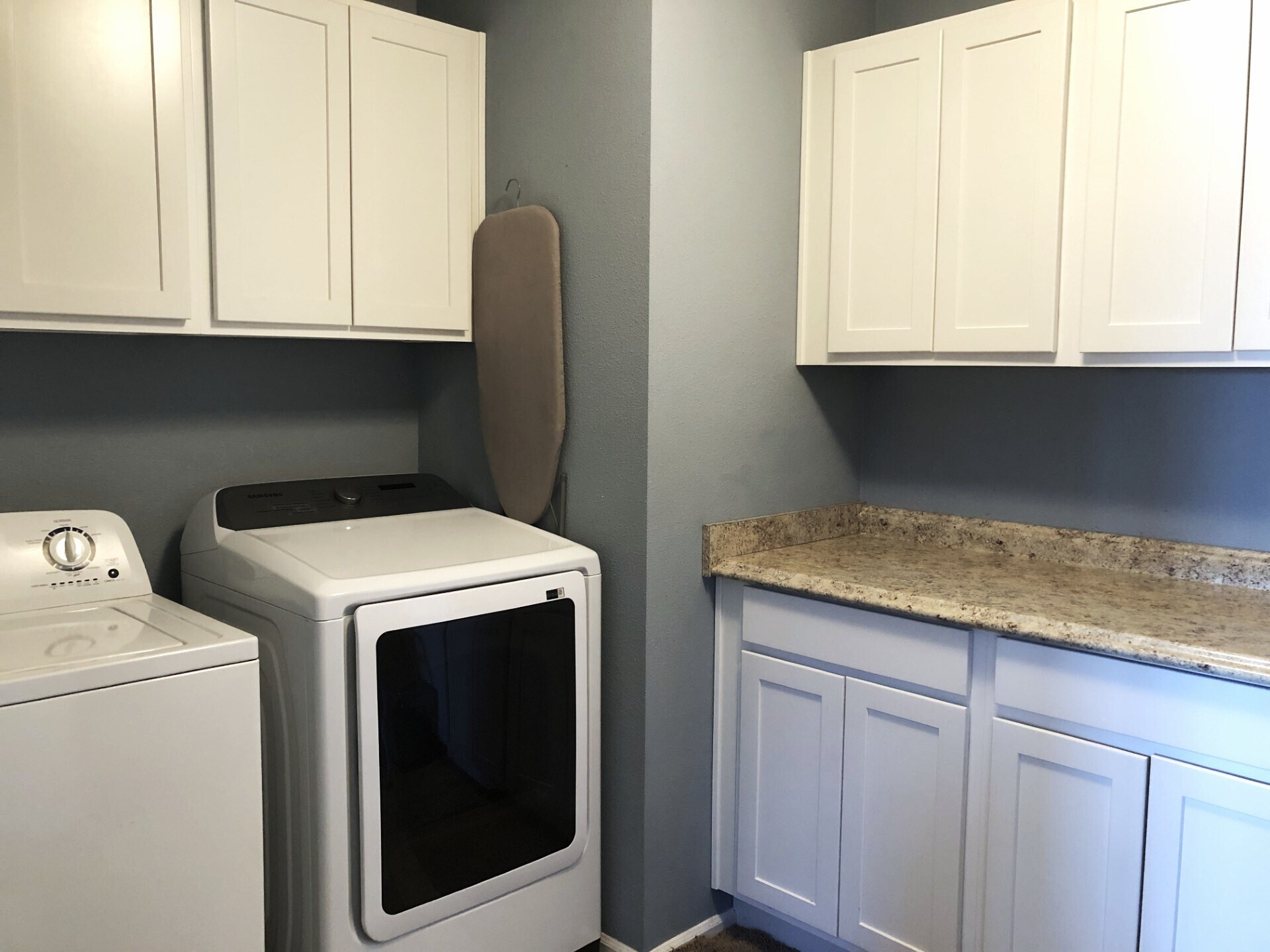 laundry room includes a vacuum, iron - 7107 120th St NW