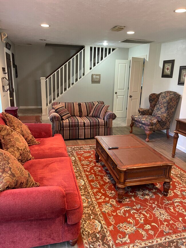 Front living room, stairs lead to upstairs bedrooms. Great light. - 2931 Valley Rose Dr