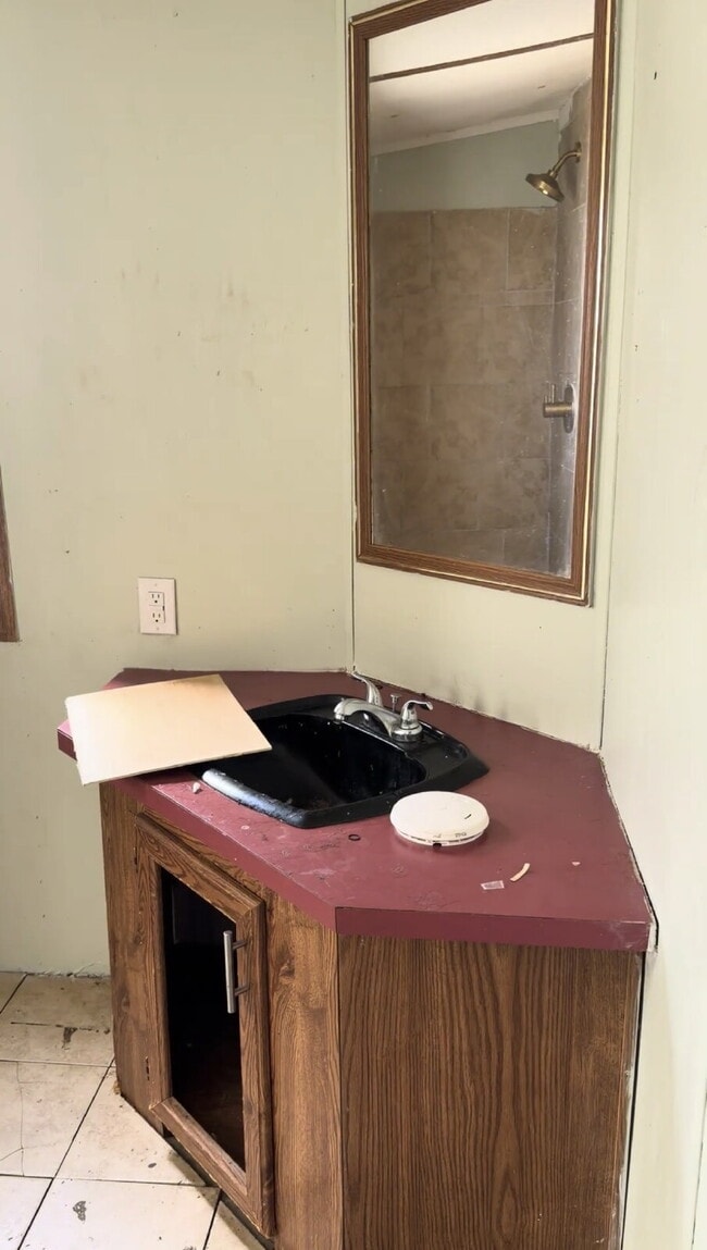 Building Photo - Handyman Special – Land + Home (Rent-to-Own)