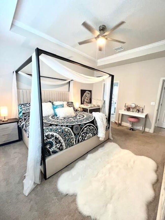 Building Photo - Open concept home offering four bedrooms, three baths, a two car garage and open lanai.