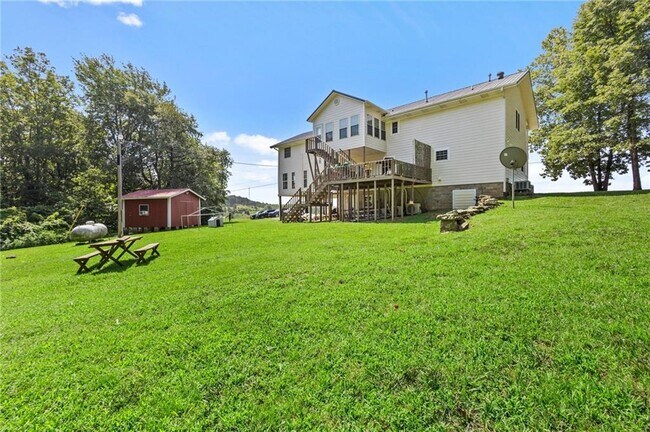 Building Photo - 10940 Devils Den Rd