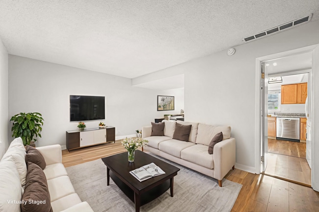 Building Photo - 3BR Townhome in Aurora | Private Yard, Covered Parking & Community Pool