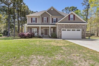 Building Photo - Spacious Home with Screened Porch & Community Kayak Launch