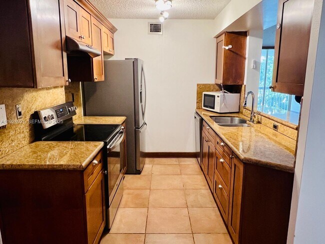 Building Photo - 4990 NW 97th Pl