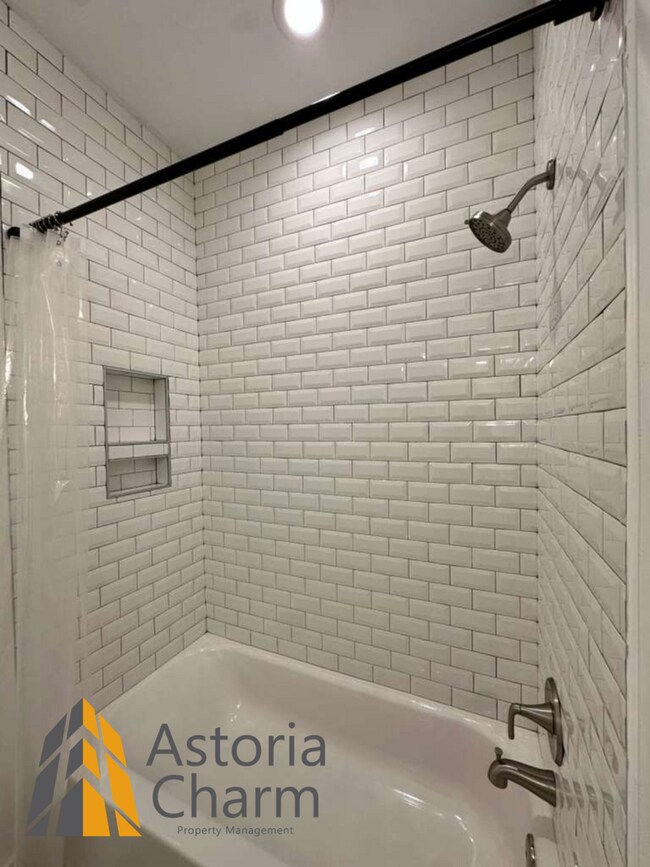 Building Photo - Beautifully Renovated 3BR Rowhome Near Johns Hopkins – Gated Parking + Modern Upgrades