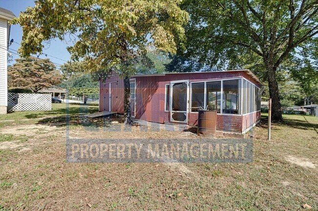 Building Photo - Updated house with carport and shed on corner lot!