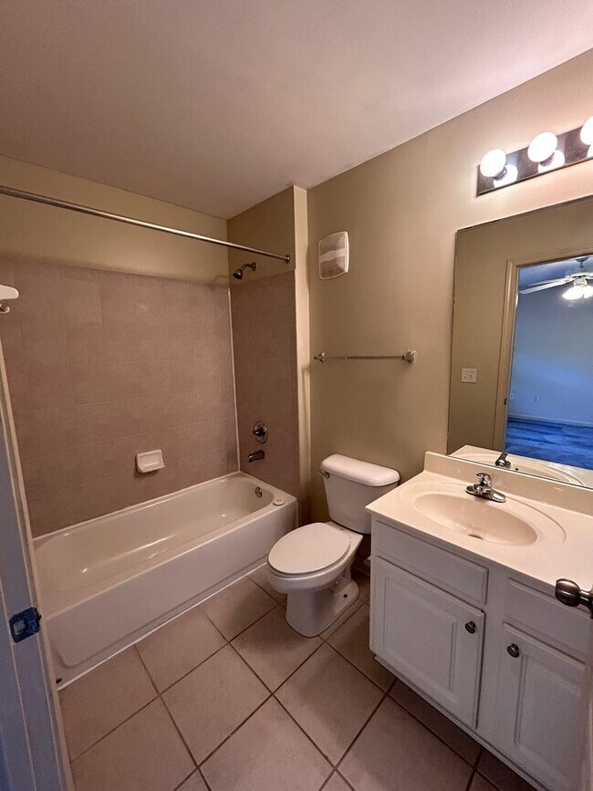 Building Photo - Two Bedrooms Available in this Three Bedroom Flat, Female Applicants!