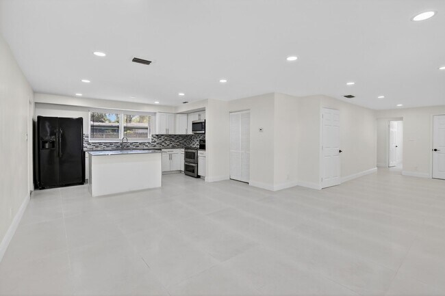 Building Photo - Renovated 3BR/2BA Corner Single-Family Home – Large Fenced Yard, NO HOA