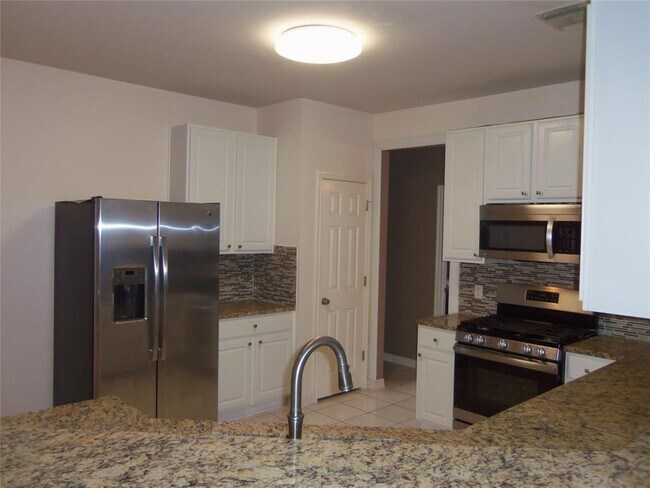 Building Photo - 15848 Garrison Cir