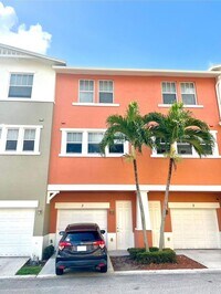 Building Photo - Luxury Townhouse West Palm Beach Gated Community two bedroom three bathrooms!