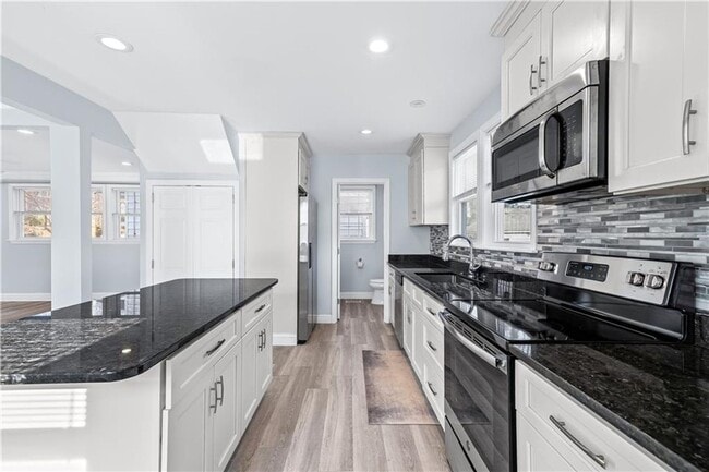 Building Photo - Fully Renovated Single Family Elmhurst Home Near PC & Downtown Providence