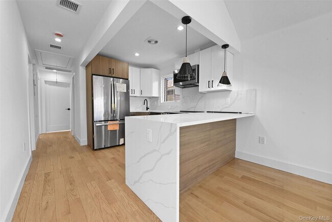 Building Photo - 38-40-40 215th St