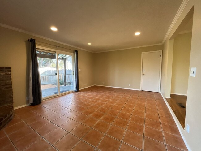 Building Photo - Classic Comfort: 3-Bed, 1.5-Bath Home with Covered Patio & Deck