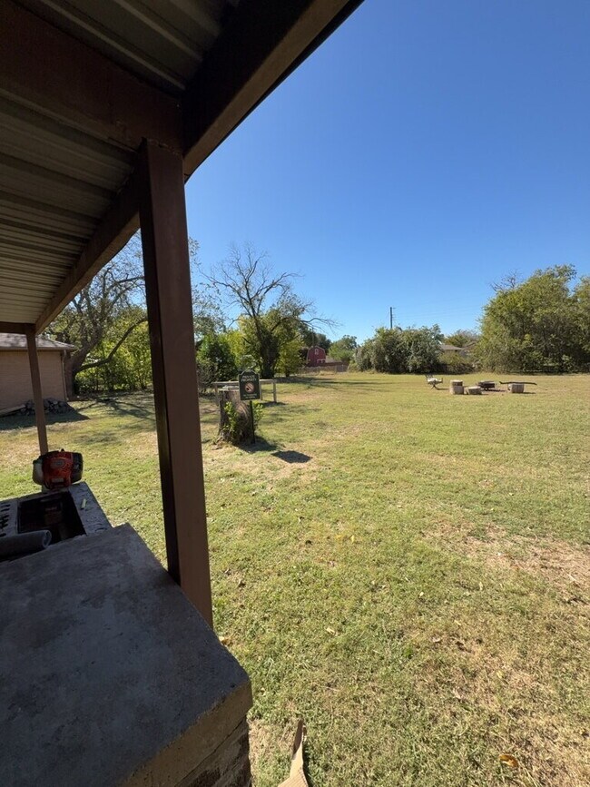 Building Photo - Spacious 4 Bedroom Home with Park-Like Backyard!