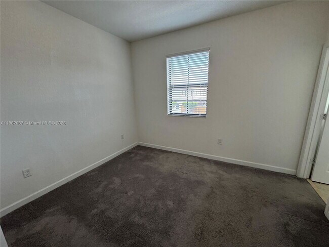 Building Photo - 24970 SW 112th Ct