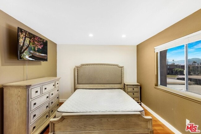 Building Photo - Furnished (also available unfurnished - please inquire) 3-Bedroom Townhome in a Gated Palm Spring...