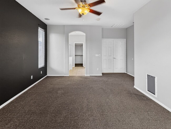 Building Photo - Single-level 4 bed, 2 bath home with tandem 3-car garage and RV gate.