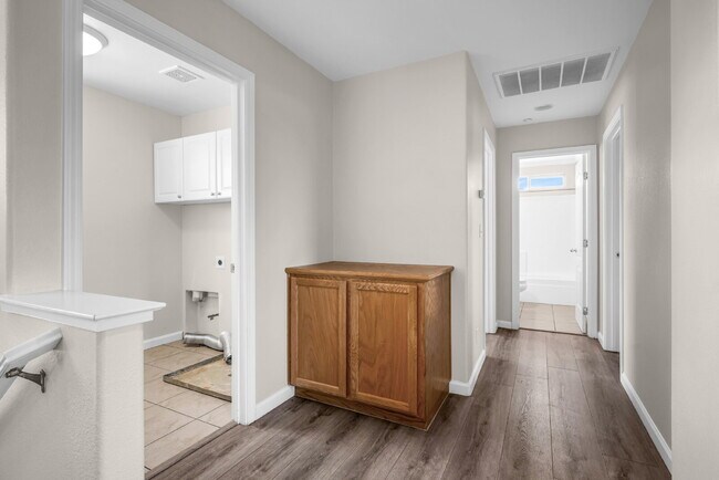 Building Photo - The Woodland Rental You've Been Looking For