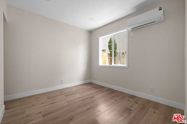 Building Photo - 21007 Saticoy St