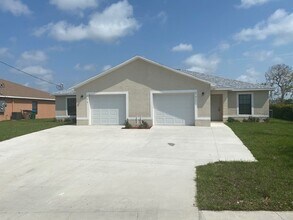 Building Photo - $250 move in special - 3 bedroom, 2 bath Duplex