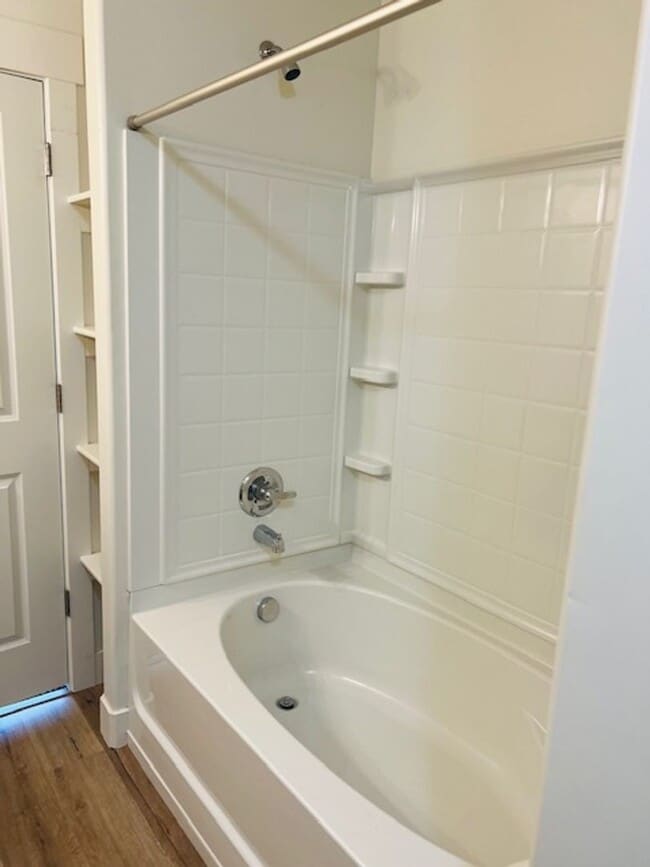 Building Photo - Beautiful townhome with 2 car deep garage ...