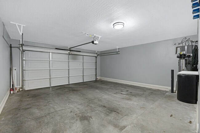 Building Photo - Modern Tri-Level Townhome in Copper Leaf C...