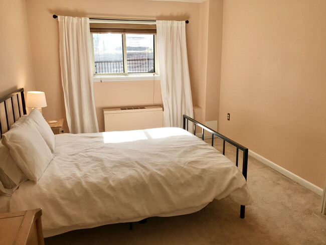 Bedroom with large walk-in closet - 200 N Maple Ave