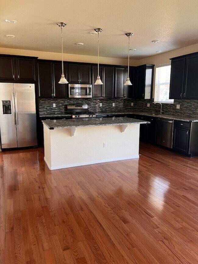 Building Photo - Beautiful Sierra Ridge 4-Bedroom, 3.5-Bath...